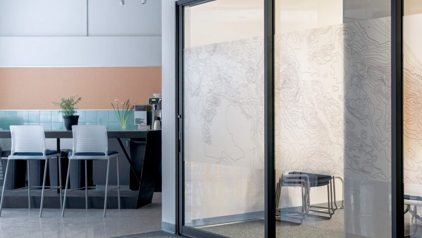 advantages of sliding doors; stylish sliding doors in an office